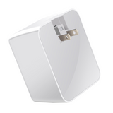 White 4-port travel wall charger with USB, Type-C, and QC3.0 outputs, compact and designed for international travel charging needs.