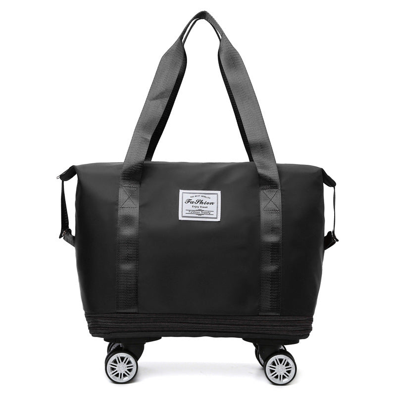 Black rolling duffel bag with a visible brand label on a white background expandable