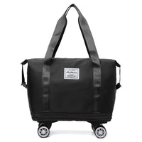 Black rolling duffel bag with a visible brand label on a white background expandable