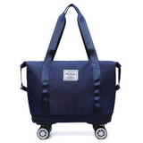 Navy blue travel bag with wheels on a white background expandable to 75l