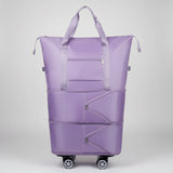 Purple expandable tote bag with wheels on a white background