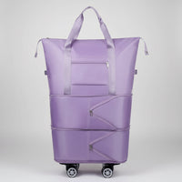 Purple expandable tote bag with wheels on a white background