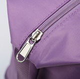Closeup of the zipper of the Expandable tote bag with removable wheels 