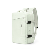 Expandable travel backpack in light mint green, water-resistant with multiple compartments, cute feminine style, TSA zipper access, laptop pocket, shoe and wet item sections, and USB charging port. 