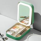 Green makeup case with an LED mirror on a light gray background