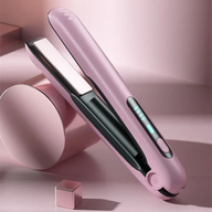 Pink wireless USB hair straightener on a pink background