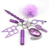 Travel-friendly self-defense keychain tools attached to matching lanyard, showing compact size and stylish color-coordinated design for women.
