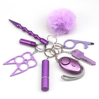 Travel-friendly self-defense keychain tools attached to matching lanyard, showing compact size and stylish color-coordinated design for women.