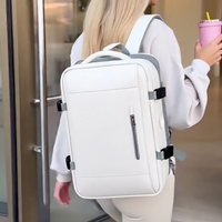 Stylish woman wearing a cute aesthetic beige expandable travel backpack with laptop compartments entering a building