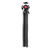 The octopus phone dslr flexible tripod - Flexible black phone selfie octopus tripod with bendable legs and phone clip, shown in a modern minimalist setup for travel and content creation.