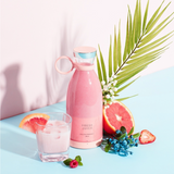 Portable smoothie blender in pink, compact travel blender with dual blades and USB magnetic charging, ideal for fresh smoothies on the go.