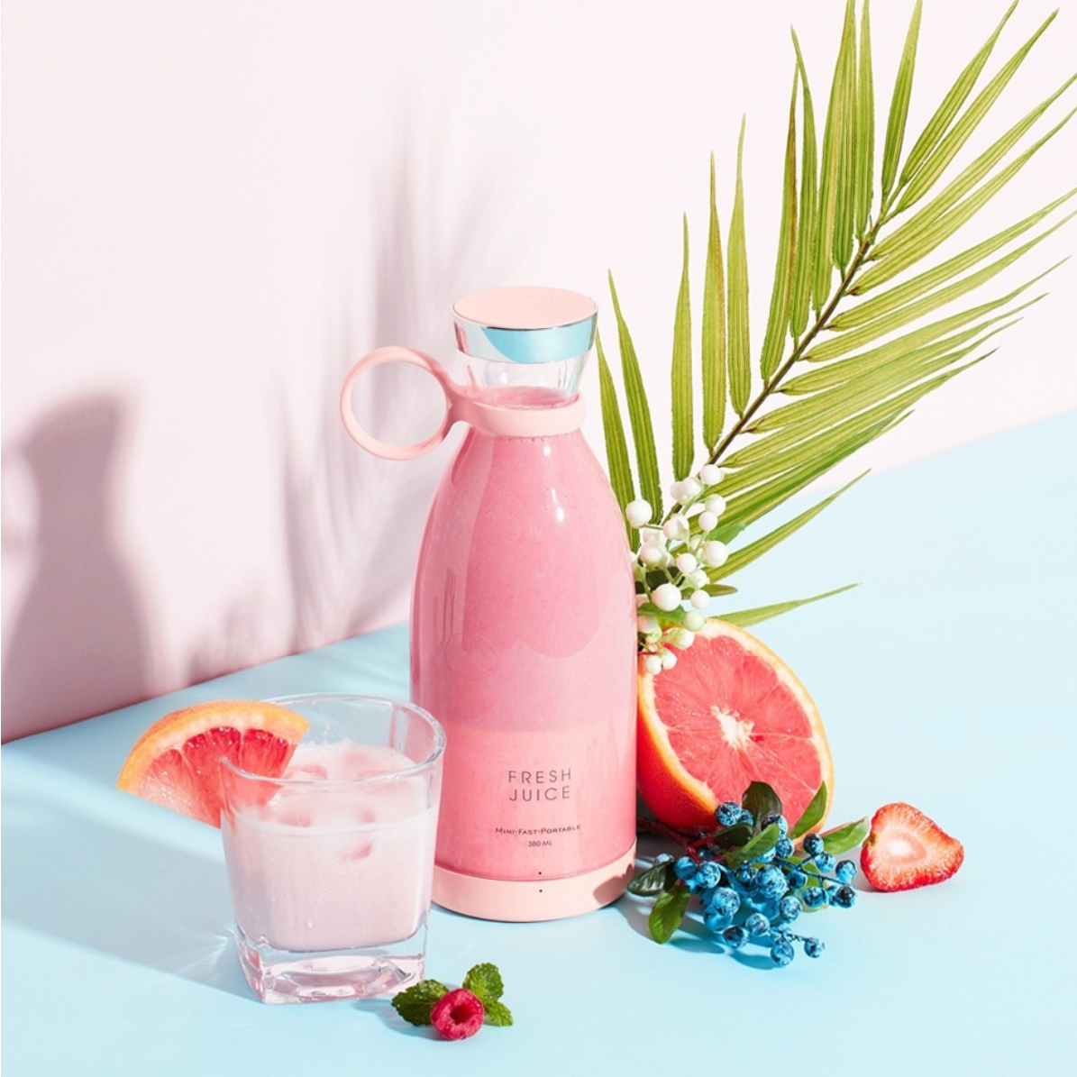 Portable smoothie blender in pink, compact travel blender with dual blades and USB magnetic charging, ideal for fresh smoothies on the go.