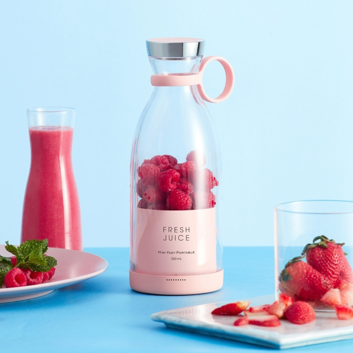 Portable smoothie blender in pink, compact travel blender with dual blades and USB magnetic charging, ideal for fresh smoothies on the go.