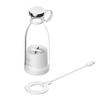 A portable smoothie blender with USB magnetic charging cable and dual blades. The blender bottle is clear with a white and pink body, and the blender unit is white with a silver blade.
