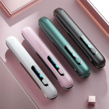 Four wireless USB hair straightener on a pink background